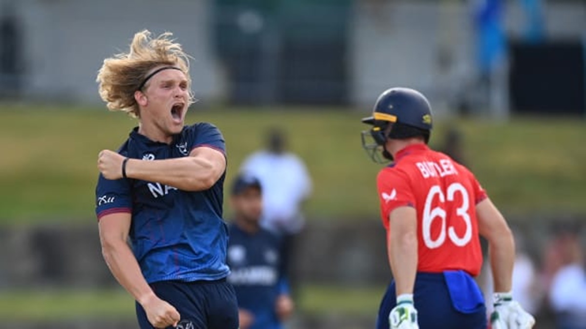 Namibia's Ruben Trumpelmann exults after rattling the stumps of England opener Jos Buttler early.