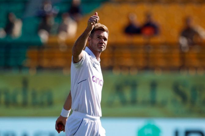England's James Anderson acknowledges the crowd after taking his 700th Test wicket following the dismissal of India's Kuldeep Yadav, caught out by Ben Foakes