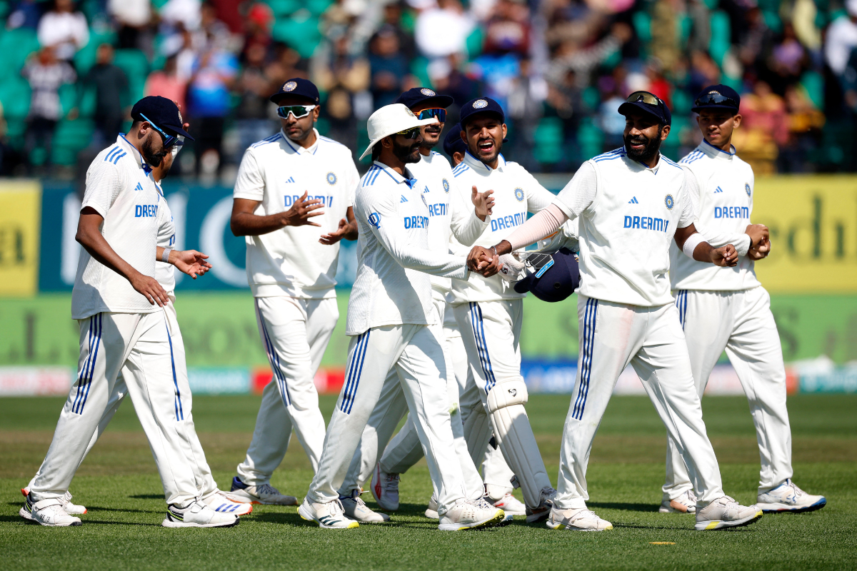 India players celebrate after winning the 5th Test match against England in Dharamsala on Saturday