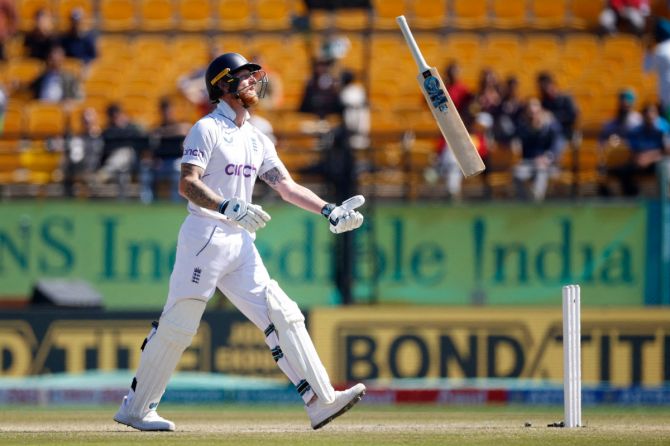 England's Ben Stokes reacts after losing his wicket, bowled out by India's Ravichandran Ashwin 