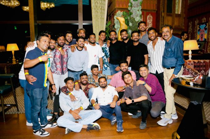 Mumbai players celebrate their Ranji Trophy victory with MCA officials on Friday