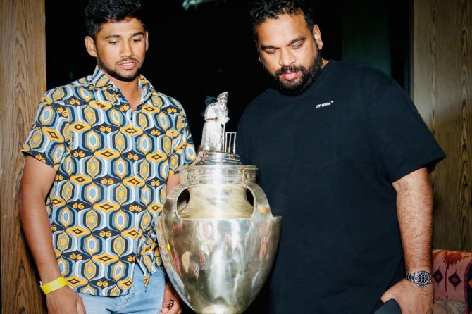 Mumbai player Musheer Khan with Ajinkya Naik with the Ranji Trophy