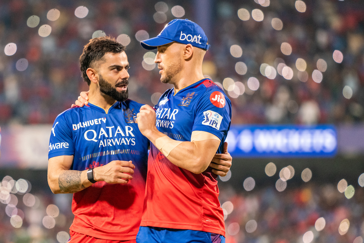 Virat Kohli and Faf Du Plessis embrace after Royal Challengers Bengaluru beat Gujarat Titians in the IPL match in Bengaluru to stay in the reckoning for a play-offs berth.
