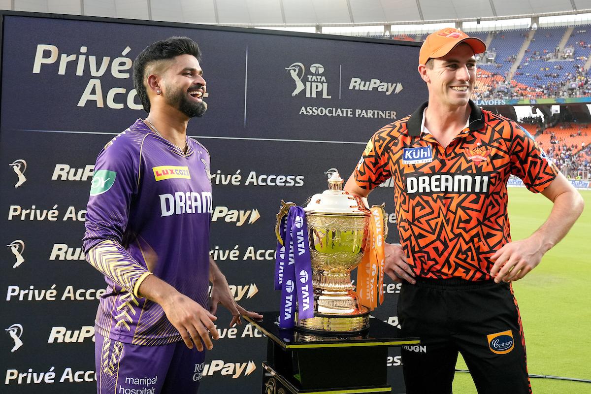 KKR skipper Shreyas Iyer and SRH skipper Pat Cummins pose with IPL Trophy.