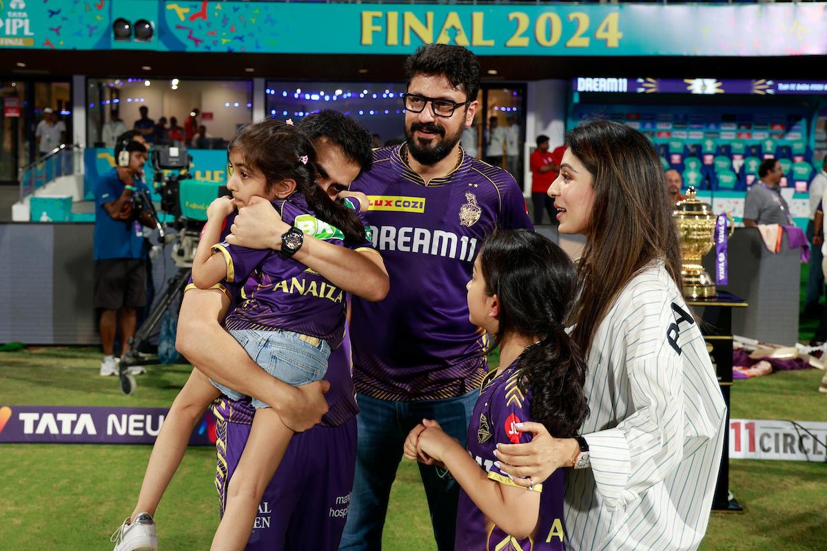 Gautam Gamhir hugs his daughter and celebrates with his family