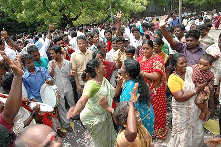 DMK supporters celebrate after announcement of results