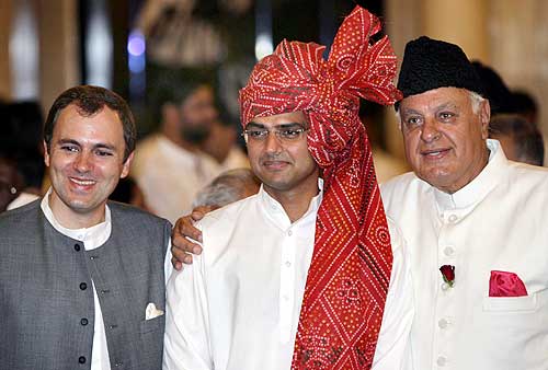 Farooq Abdullah, Sachin Pilot and J&K Chief Minister Omar Abdullah pose before the oath-taking ceremony