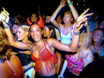 People dance during Ibiza's MTV Festival 2000 at La Pedrera de San Antoni.