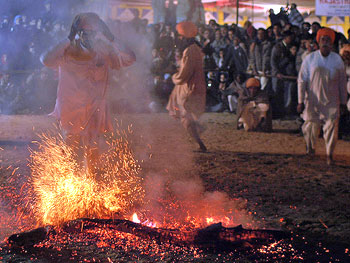 The Fire Dance is performed by members of the Sidh community.