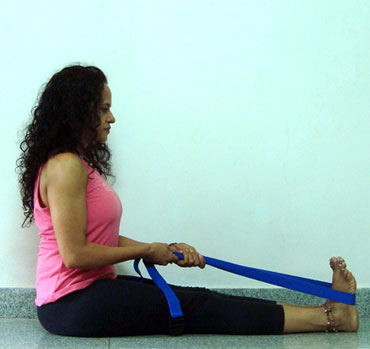 Dandasana helps remove removes spinal misalignment and improves breathing