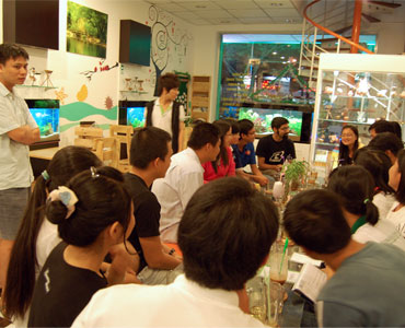 Anirvan, at the back end of the left row, meets youth climate activists in Ho Chi Minh City, Vietnam