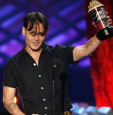 Although Depp sports his body art often, the 'wino' tattoo on his upper arm is rarely on display