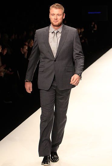 Former England cricket all-rounder Andrew Flintoff took our breath away as he walked down the ramp in dapper charcoal-grey suit at Naomi Campbell's Fashion For Relief Haiti London 2010 Fashion Show at Somerset House in London on February 18, 2010
