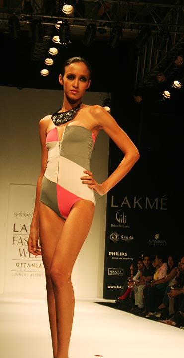 A model shows off beachwear by Shrivan-Naresh