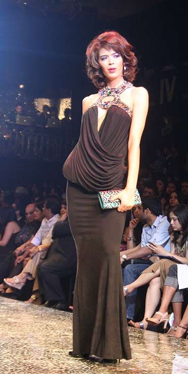 A model wears a Suneet Varma classic gown on the ramp