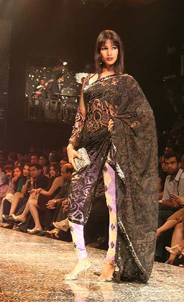Nicole Faria strikes a pose in a Suneet Varma semi-drape