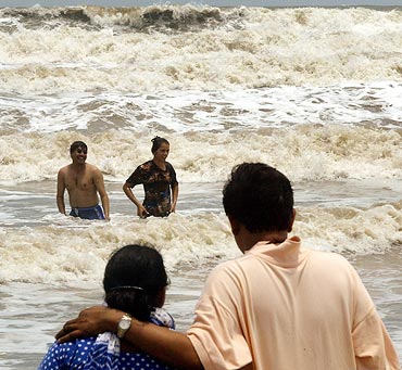 Newly married Indian couples enjoy at Colva beach in Goa
