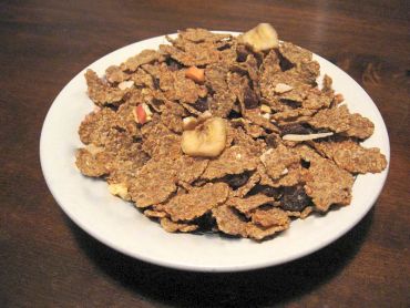 Mix nuts with instant low-calorie breakfast cereals