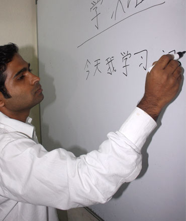 An instructor at the Excel Academy in Mumbai