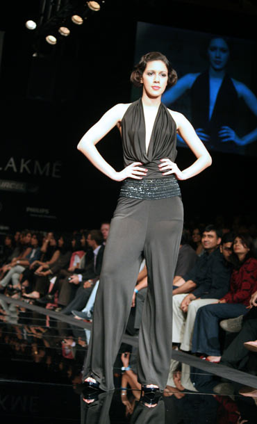A model showcases a creation by Ritu Kumar