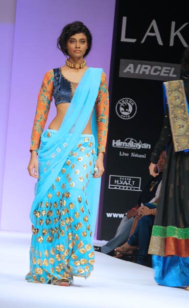 A model showcases Anupamaa's creation