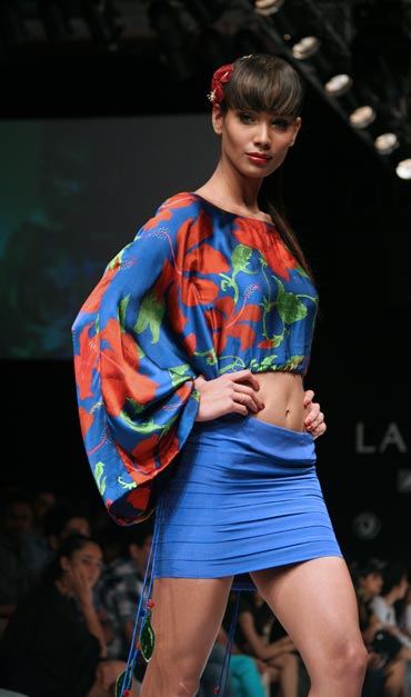 A model showcases a creation by Debarun Mukherjee
