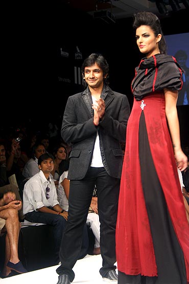 Designer Arjun Agarwal is dwarfed by his showstopper