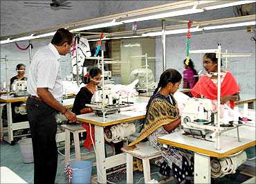 Women stitching clothes at a garments unit in Tirupur.