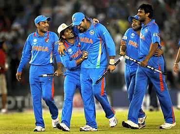 Indian players celebrate after winning their semi-final match against Pakistan