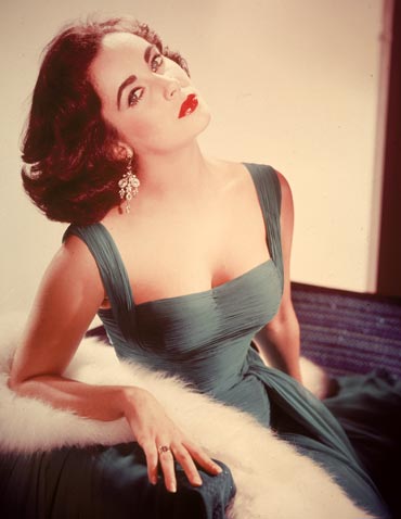 A portrait of Elizabeth Taylor from the '50s -- note the stunning earrings