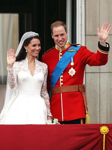 Their Royal Highnesses Prince William, Duke of Cambridge and Catherine, Duchess of Cambridge greet well-wishers from the balcony at Buckingham Palace on April 29, 2011 in London, England.