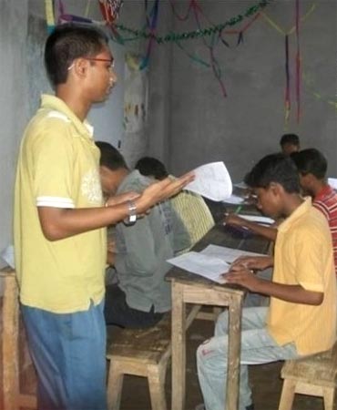 Anupam (left) taking a class at Escape