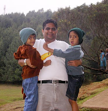 Mrudhula and Mrithika with their dad