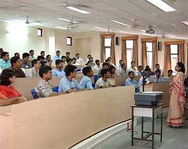 Management students attending a lecture at one of the IIMs