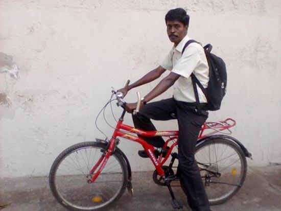 G Murgaraj delivers books on his cycle