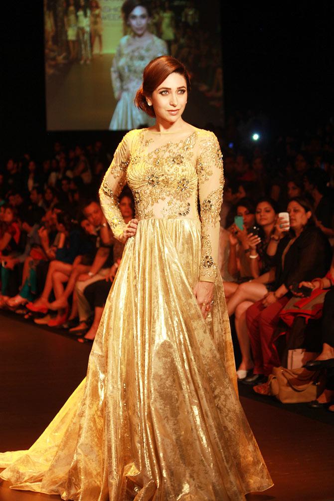 Karisma Kapoor walks the ramp for Vikram Phadnis