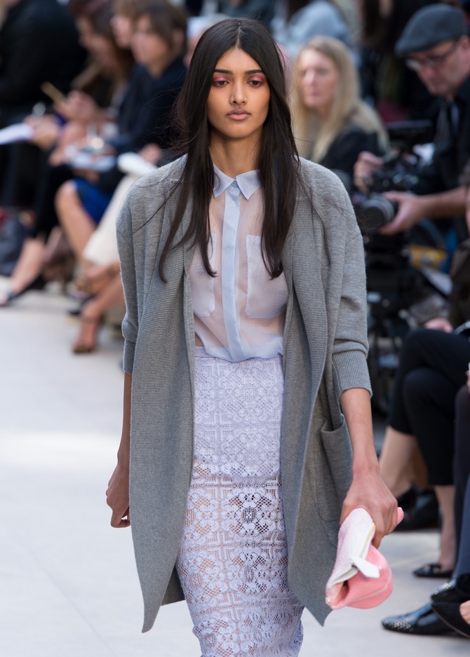Neelam Johal walks the runway at the Burberry Prorsum show at London Fashion Week SS14 at Kensington Gardens on September 16, 2013 in London, England.
