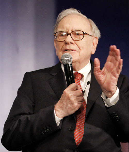 Billionaire Warren Buffett speaks during a news conference in New Delhi