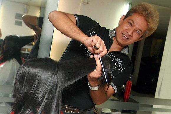 Jawed Habib working at his salon