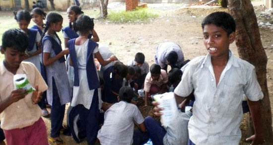 Students of a government school at a tree plantation drive