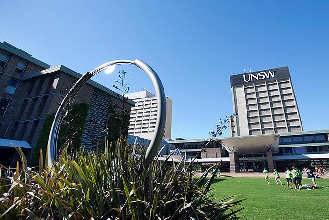 The University of New South Wales' library building and lawn area