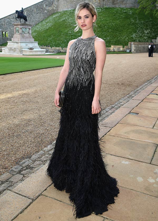 Actress Lily James arrives for a dinner to celebrate the work of The Royal Marsden hosted by the Duke of Cambridge at Windsor Castle on May 13, 2014 in Windsor, England.