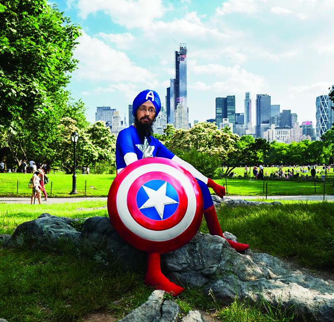 Vishavjit Singh, a New York-based Sikh cartoonist and creator of Sikhtoons, dressed as Captain America.