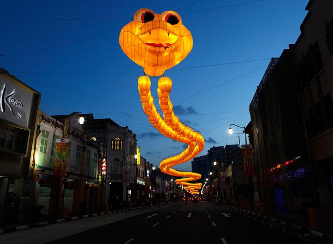 A snake decoration is seen along a street in preparation for the upcoming Chinese New Year of the Snake in February, in Chinatown in Singapore January 29, 2013.