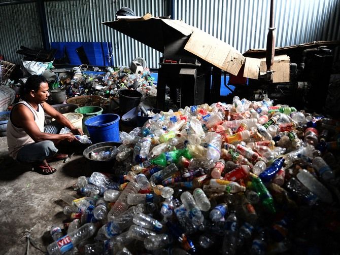 Image: The informal sector forms the backbone of the recycling value chain and is responsible for achieving recycling rates of 70 per cent -- one of the highest in the world. (Image for representational purposes only.) Photographs: Robertus Pudyanto/Getty Images