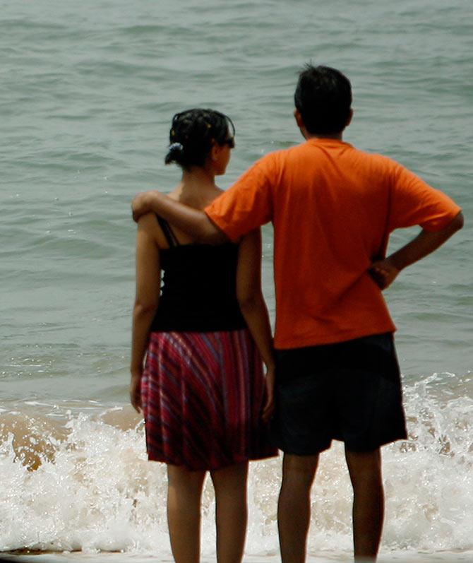 Tourists at Anjuna beach in the western Indian state of Goa