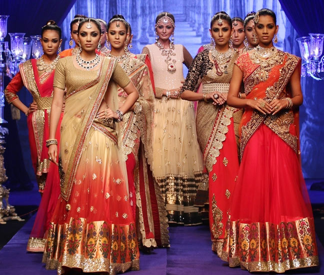 Models walk the runway at India International Jewellery Week