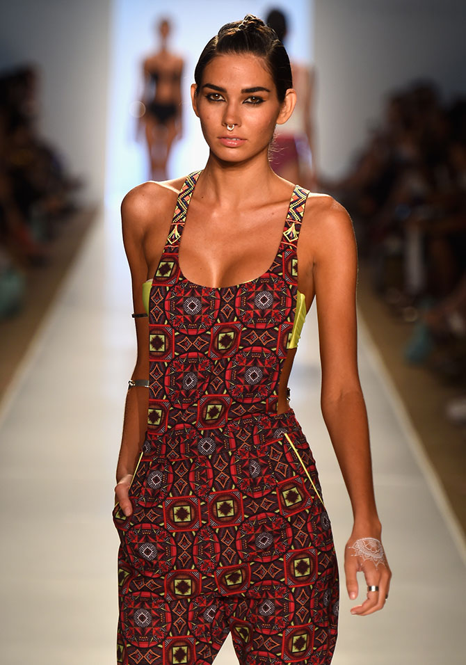 A model walks the runway for Pooja Kharbanda's new beachwear collection at Mercedes-Benz Swim Fashion Week.
