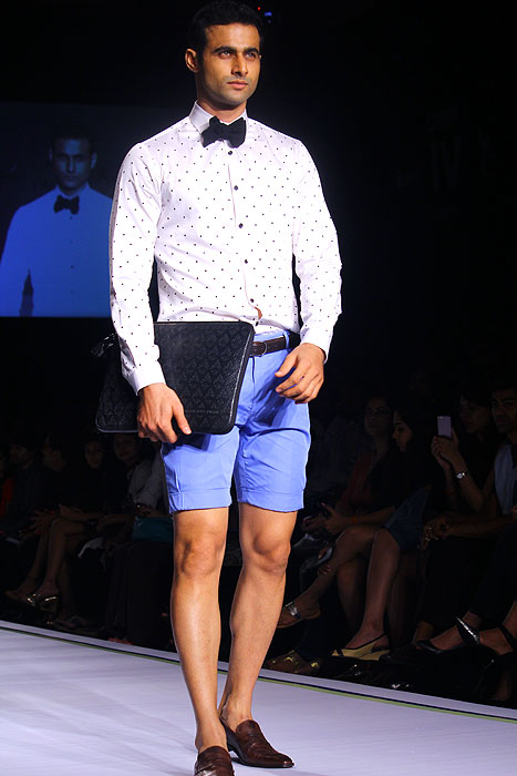 Shorts can be stylish too but don't forget to shave your legs :-) Seen here is Freddy Daruwala walking for Shantanu and Nikhil
