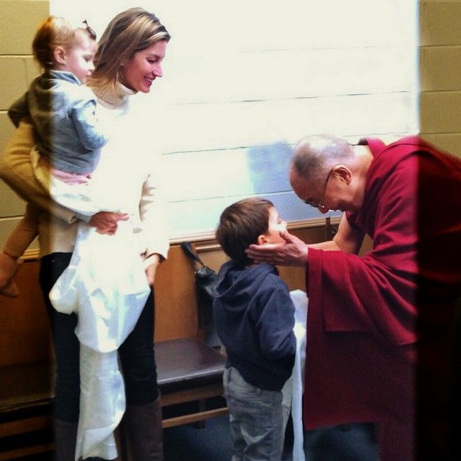 Gisele Bundchen with her children and the Dalai Lama